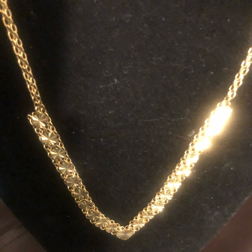 Beautiful gold colored adjustable necklace/choker